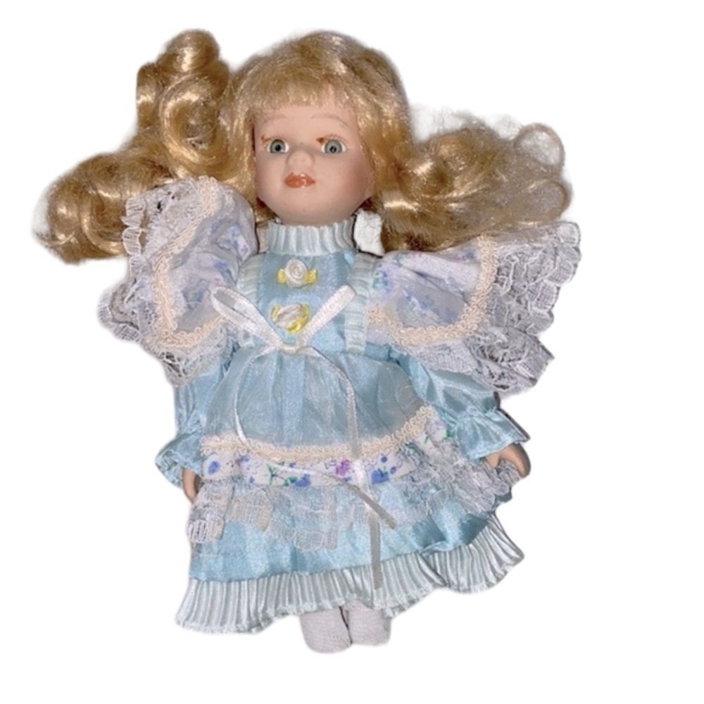 Vintage small porcelain doll